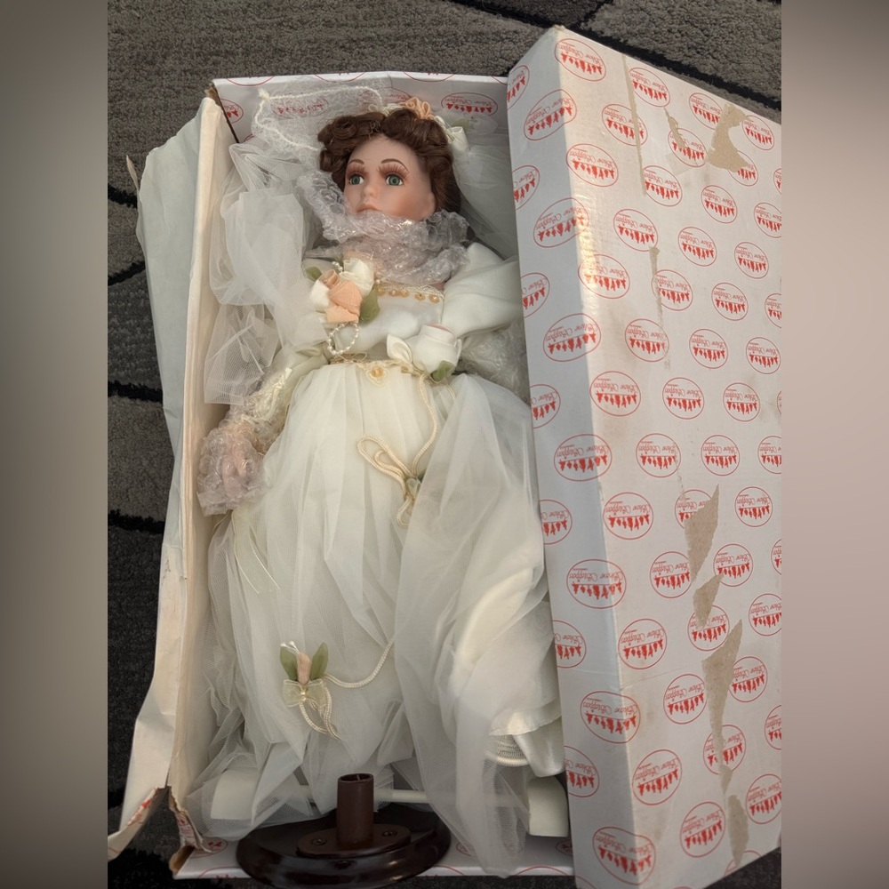 Charming White Porcelain Doll with Floral Accents